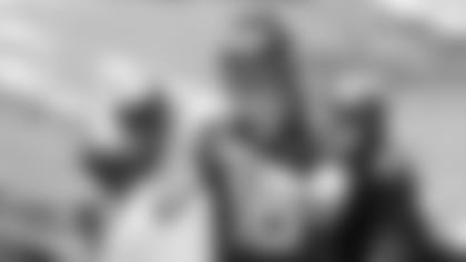 Jacksonville Jaguars quarterback Trevor Lawrence (16) warms up during an NFL football rookie minicamp, Saturday, May 15, 2021, in Jacksonville, Fla. (AP Photo/John Raoux)