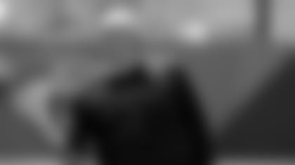 Jacksonville Jaguars defensive coordinator Todd Wash watches players on the field during an NFL football practice, Thursday, May 30, 2019, in Jacksonville, Fla. (AP Photo/John Raoux)