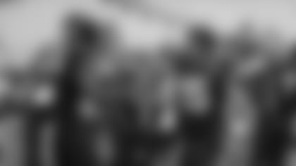 Jacksonville Jaguars quarterback Gardner Minshew (15) greets teammate defensive end Josh Allen, left, before an NFL football game, against the Los Angeles Chargers Sunday, Dec. 8, 2019, in Jacksonville, Fla. (AP Photo/John Raoux)