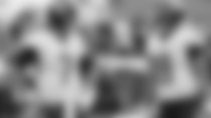 Tennessee Titans quarterbacks Blaine Gabbert (7) and Marcus Mariota (8) talk before an NFL football game against the Houston Texans Sunday, Sept. 16, 2018, in Nashville, Tenn. (AP Photo/Mark Zaleski)