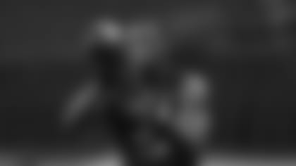 Miami linebacker Shaquille Quarterman runs a drill at the NFL football scouting combine in Indianapolis, Saturday, Feb. 29, 2020. (AP Photo/Charlie Neibergall)