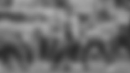 Houston Texans quarterback Davis Mills (10) behind center Justin Britt (68) call out signals during the second half of an NFL football game against the Houston Texans, Sunday, Dec. 19, 2021, in Jacksonville, Fla. Texans defeated the Jaguars 30-16. (AP Photo/Gary McCullough)