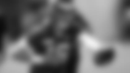 Jacksonville Jaguars quarterback Trevor Lawrence runs a play during an NFL football team practice, Tuesday, June 8, 2021, in Jacksonville, Fla. (AP Photo/John Raoux)