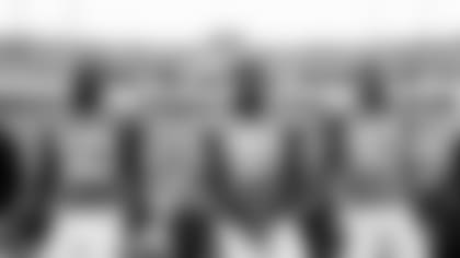 Jacksonville Jaguars linebacker Telvin Smith (50) stands with his teammates defensive tackle Taven Bryan (90) and defensive tackle Calais Campbell (93) prior to a game against the New England Patriots, Sunday, Sept. 16th, 2018 in Jacksonville, Fla. Jaguars defeated the Patriots 31-20. (Logan Bowles via AP)