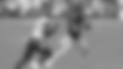 Jacksonville Jaguars quarterback Gardner Minshew (15) scrambles from Tennessee Titans inside linebacker Rashaan Evans (54) in the first half of an NFL football game Sunday, Sept. 20, 2020, in Nashville, Tenn. (AP Photo/Mark Zaleski)