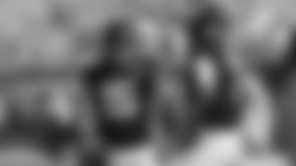 Jacksonville Jaguars quarterbacks Gardner Minshew (15) and Nick Foles (7) talk during warm ups before an NFL football game against the Tampa Bay Buccaneers, Sunday, Dec. 1, 2019, in Jacksonville, Fla. (AP Photo/John Raoux)