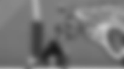 Jacksonville Jaguars running back Travis Etienne Jr. (1) catches a pass during a drill at NFL football rookie minicamp, Saturday, May 15, 2021, in Jacksonville, Fla. (AP Photo/John Raoux)