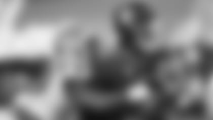 LSU linebacker K'Lavon Chaisson (18) sacks Oklahoma quarterback Jalen Hurts (1) during the first half of the Peach Bowl NCAA semifinal college football playoff game, Saturday, Dec. 28, 2019, in Atlanta. (AP Photo/John Amis)