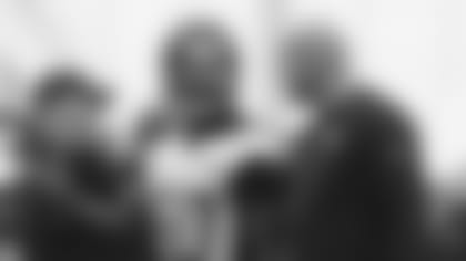 Jacksonville Jaguars linebacker Telvin Smith (50) talks with defensive coordinator Todd Wash during organized team activities, Tuesday, May. 22, 2018 in Jacksonville, Fla. (Logan Bowles / AP)