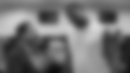 Jacksonville Jaguars team owner Shad Khan talks with defensive end Calais Campbell in the locker room following the Jags season opening victory against the New York Giants in an NFL game Sunday, September 9, 2018 in East Rutherford, NJ. (Rick Wilson via AP)