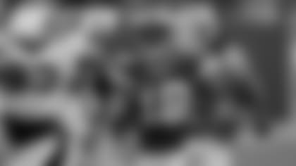 Green Bay Packers' Randall Cobb runs back a kick off for a touchdown during the second half of an NFL football game against the New Orleans Saints Thursday, Sept. 8, 2011, in Green Bay, Wis. The Packers won 42-34.