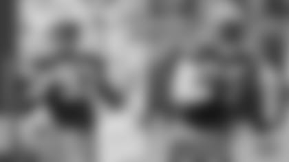 LB Tim Harris and WR Greg Jennings