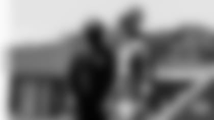 Offensive coordinator Nathaniel Hackett and QB Aaron Rodgers