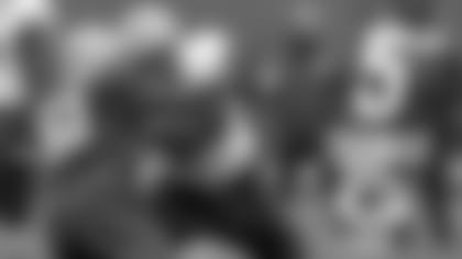 T David Bakhtiari (69) and LB Kyler Fackrell (51)