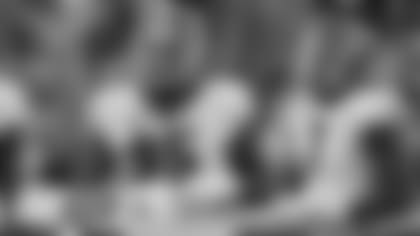 DL Devonte Wyatt (95) and LB Quay Walker (7)