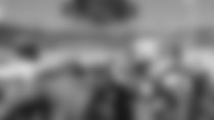 Running backs huddle