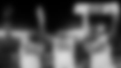 Linebackers Za'Darius Smith, Preston Smith, Rashan Gary