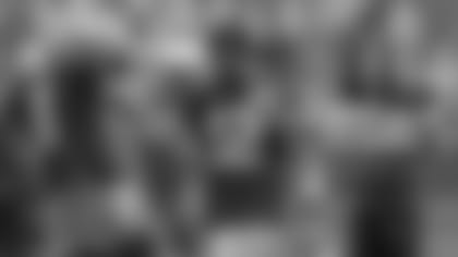 Quarterbacks Tim Boyle and Aaron Rodgers