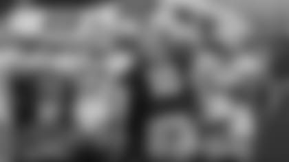 Green Bay Packers QB Jordan Love calls a play during a 2022 training camp practice at Ray Nitschke Field.