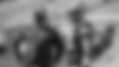 Offensive coordinator Nathaniel Hackett and QB Aaron Rodgers