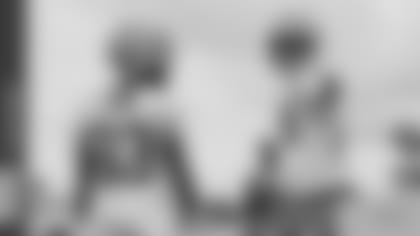 Running backs Aaron Jones and AJ Dillon