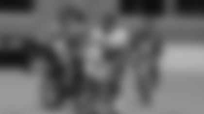 Rookies RB AJ Dillon, TE Josiah Deguara, and QB Jordan Love riding bikes