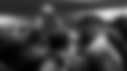 Look inside the Packers locker room before and after Sunday's win over the Bills.