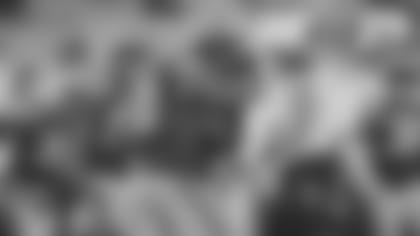 Linebackers Rashan Gary, Preston Smith and Za'Darius Smith