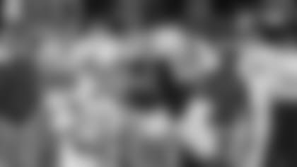 FILE - In this Dec. 29, 2016, file photo, Arkansas's Cheyenne O'Grady, left, runs down the sideline as he is pursued by Virginia Tech's Andrew Motuapuaka, right, during the first half of the Belk Bowl NCAA college football game in Charlotte, N.C. Oâ€™Grady missed Arkansasâ€™ first two games of the season while suspended, and he saw little action in the next two. The junior tight end has emerged as one of the Razorbacks top offensive options in the last two games, however, including a two-touchdown effort against No. 1 Alabama last week. (AP Photo/Bob Leverone, File)