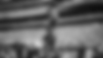 View photos of Panthers players warming up before today's game against the Giants.