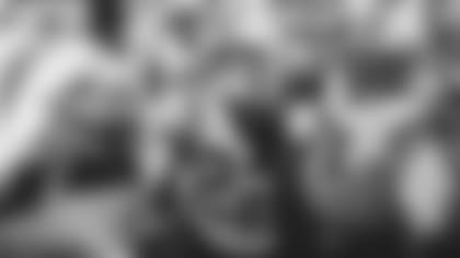 Christian McCaffrey leads huddle