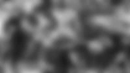 Seattle Seahawks' Chris Carson (32) is upended by Carolina Panthers' Eric Reid (25) during the second half of an NFL football game in Charlotte, N.C., Sunday, Nov. 25, 2018. (AP Photo/Mike McCarn)