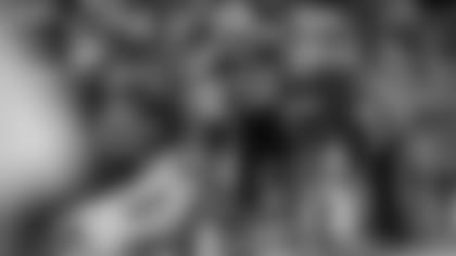 McCaffrey breaks a tackle against Seattle