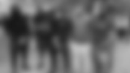 Shaq Thompson, Andre Smith, Tre Boston, Chris Manhertz and Ian Thomas at the justice walk in Charlotte on Monday.