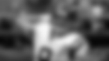 A young Brees throws a pass with the Chargers