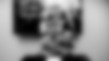 Colin Jones signing his contract