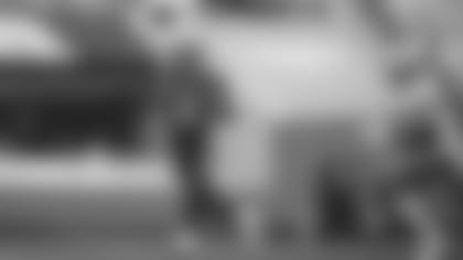 P.J. Walker throws against Lions