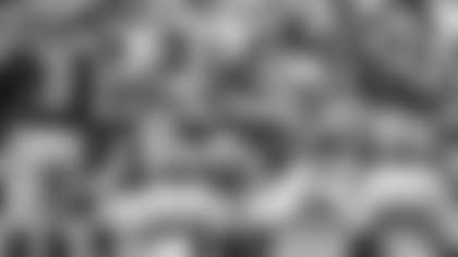 Luke Kuechly and Russell Wilson before the snap