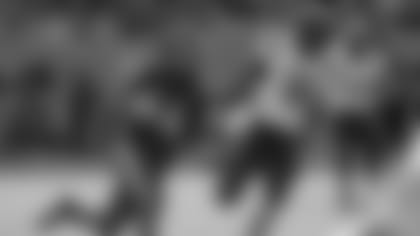 Virginia's Olamide Zaccheaus (4) runs past South Carolina's R.J. Roderick (10) for a touchdown during the second half of the Belk Bowl NCAA college football game in Charlotte, N.C., Saturday, Dec. 29, 2018. (AP Photo/Chuck Burton)