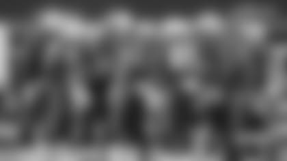 Patriots offensive line huddle up.