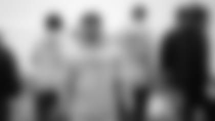 New England Patriots wide receiver Julian Edelman, front, walks on the field during an NFL football practice, Tuesday, Oct. 27, 2015, in Foxborough, Mass. Patriots quarterback Tom Brady walks on the field at right. (AP Photo/Steven Senne)