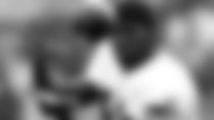 Randy Moss hauls in a pass during training camp in Foxborough, Mass. Monday, July 30, 2007.