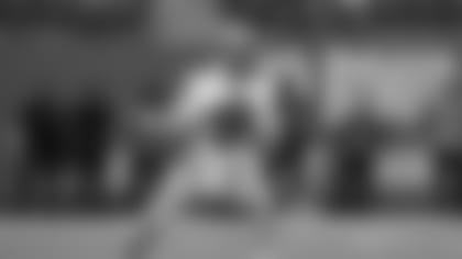 East quarterback EJ Perry (4), of Brown, looks for a receiver during the second half of the East-West Shrine Bowl NCAA college football game Thursday, Feb. 3, 2022, in Las Vegas. (AP Photo/David Becker)