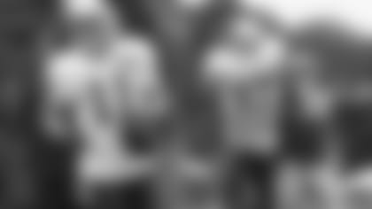 Lasondra and Allison help cut the ribbon at Pasquale’s Deli.