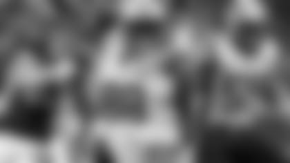 Tight End Matt LaCosse, DL Mike Pennel, and DE John Simon.