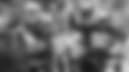 Pictured above is Patriots quarterback Mac Jones (10) and defensive lineman Christian Barmore (90).