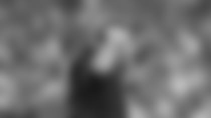 Marcus Cannon talks with the media.