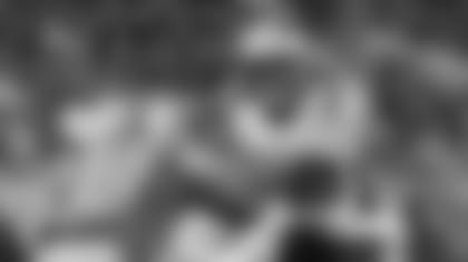 New England Patriots' Chase Winovich (50) runs into Detroit Lions' Mark Thompson (49) during a kickoff return during the first half of a preseason NFL football game Thursday, Aug. 8, 2019, in Detroit. (AP Photo/Rick Osentoski)