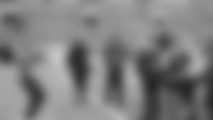 Jimmy Garoppolo prepares for the pass at the AccesSport America football clinic. Photo by Angelique Fiske