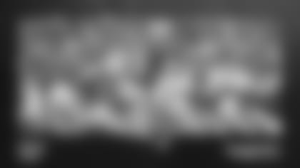 Patriots quarterback Mac Jones (10) leads the offense. Photo by Dwight Darian.